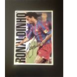 Football Ronaldinho signed 20x16 mounted signature piece. Ronaldo de Assis Moreira (born 21 March