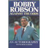 Bobby Robson signed hardback book Against the Odds signed to title page. Good Condition. All