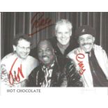 Hot Chocolate signed 10x8 b/w photo. Signed by 4. Good Condition. All signed pieces come with a