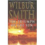 Wilbur Smith signed on title page. A hard back book The Triumph of the Sun. Includes dust cover. 500