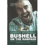 Garry Bushell signed hard back book Bushell on the Rampage. Dust cover. Signed on title page. 257