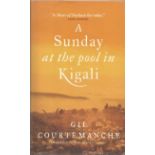 Gil Courtemanche signed hard back book A Sunday at the pool in Kigali. Signed on title page. 259