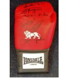 Boxing Lonsdale Glove signed by three heavyweight champions Smoking Joe Frazier, Ken Norton and Leon