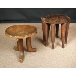 A Nigerian 'Elephant' tribal stool, with carved dished seat on eight legs 44 x 45cm (17 x 18in)