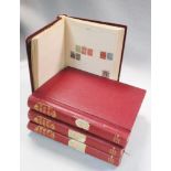 Four early 20th century stamp albums, containing World & GB