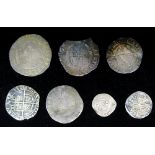 A Henry III hammered long cross penny, good VF, a James I shilling and three other hammered coins,