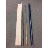 Two Thomas & Thomas carbon three piece salmon rods, one 15', the other 14', both with bags and