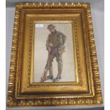 A WWI period watercolour of a British soldier in battledress, standing with head lowered, in gilt