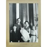 HM Queen Elizabeth II, a black & white photograph of Her Majesty and other members of the Royal