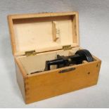 A small basic microscope with black finish, cased, and a collection of approximately 60 anatomical