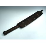 A Polynesian hardwood war club, with mother of pearl inlaid and chip calved decoration, 81cm (