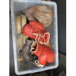 A leather portmanteau, leather Rugby balls, boxing gloves, a leather punch bag, cast iron dumb