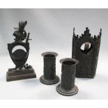 A Gothic revival pocket watch stand in the form of a tower, a pair of similar spill vases and