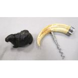 A Boar's tusk and silver mounted corkscrew, and an Inuit carved seal (2) see pics