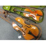 An early 20th century violin with a one piece back and scroll head, together with bow and case,