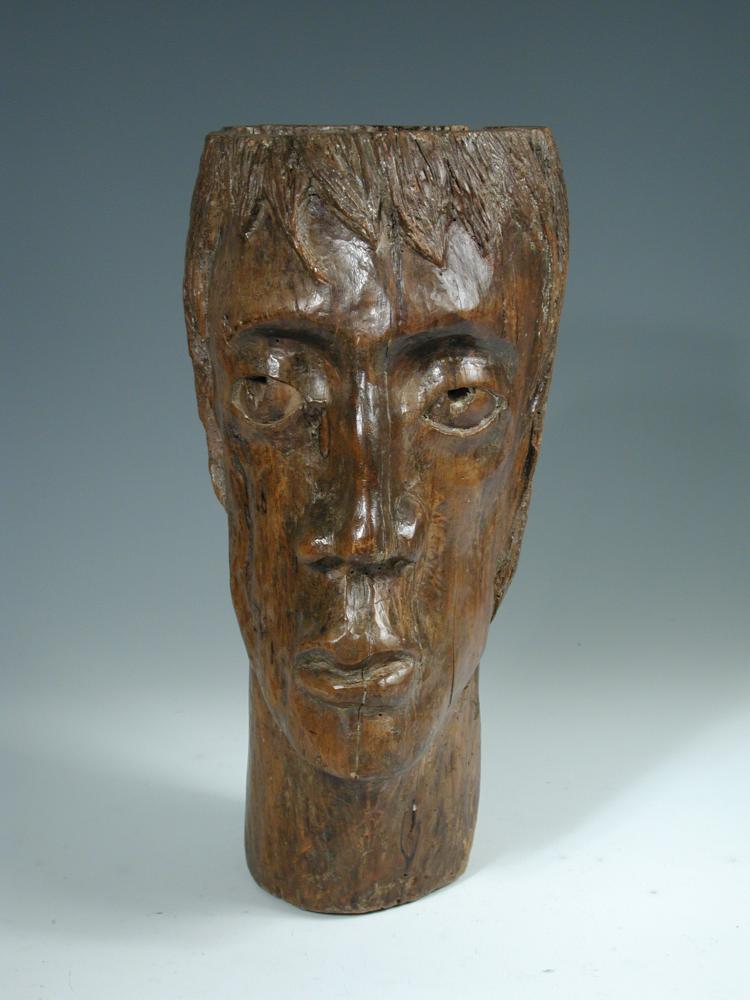 A 19th century carved walnut bust of a man, possibly French, 41cm (16in) high