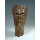 A 19th century carved walnut bust of a man, possibly French, 41cm (16in) high