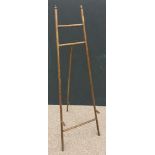 An Arts & Crafts stained beech easel, with turned finials 155cm (60in)