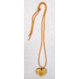 A Lalique honey coloured heart pendant, the heart shaped glass pendant with smaller intaglio heart