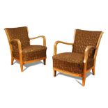 A pair of Art Deco style beech framed open arm lounge chairs, with brown geometrically-patterned