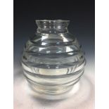 A 20th century Architectural clear glass vase, the bomb-shaped vase with horizontal ribbing,