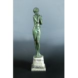 Josef Lorenzl, (Austrian, 1892-1950), a large green patinated bronze model of a coy maiden, the nude