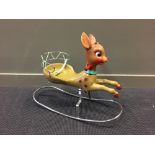 A 1960's Canova Bambi baby rocker, the modelling based on the Walt Disney character, with chrome