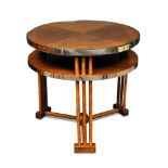An Art Deco oak two-tier occasional table, the circular tiers each with chrome banding and supported