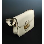 Celine, a cream leather handbag, with dark brown piping and original dust bag 18 x 24cm (7 x 9in)