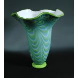 A large Cornings art glass vase, the trumpet form with scalloped rim to a spreading circular foot,