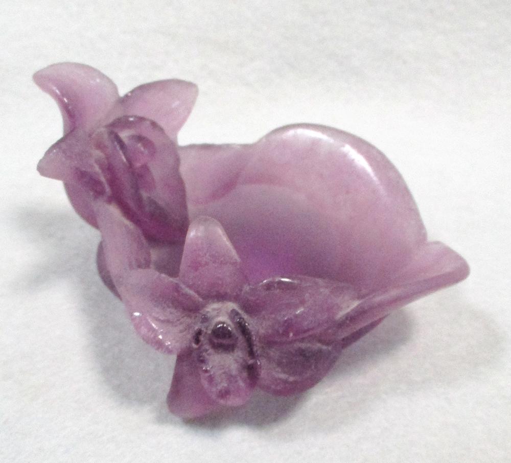 A modern Daum pate de verre violet glass moulded dish, modelled as flower heads, etched mark 4.50