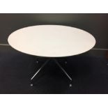 Antonio Citterio for B&B Italia, a white circular coffee table, the laminate top to a satin