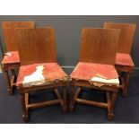 A set of four Heal's light oak 'Tilden' dining chairs, the red leather seats above gun barrel