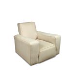 Betty Joel, a large pair of cream upholstered modernist armchairs, with squared arms and raised on