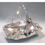 A WMF electroplated bread basket, the rectangular form with scalloped rim and twisted handle,