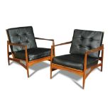 A pair of 1960's Danish teak open armchairs, with buttoned black vinyl back and seat cushions,