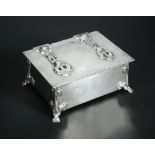 An Arts & Crafts style silver table casket by T. F. & Co., London 1927, the repoussé box with