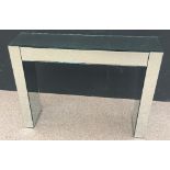 A contemporary mirrored console table, the rectangular top over a single frieze drawer 91 x 121 x