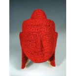 § David Mach, (Scottish, b.1956), Keeper of the flame: The Buddha, a matchstick head in red,
