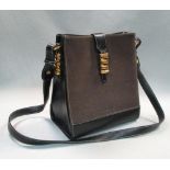 Loewe, a grained brown leather handbag, with black leather handle, sides and base, gilt metal