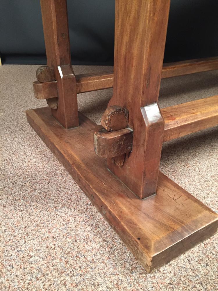 An Arts & Crafts walnut refectory table, the rectangular top supported to either end by a pair of - Image 4 of 5