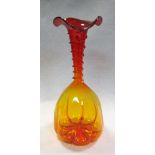 An amber coloured art glass mallet shaped vase, the bulbous base to a slender neck with ribbon
