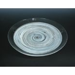 A Cenedese Murano art glass charger, of clear glass encasing grey and blue swirls, signed to