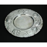 A small Arts & Crafts silver salver by W. G. Connell, London 1918, the rim embossed with fruit and