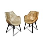 A pair of 20th century leather side chairs, each with bucket seat upholstered in tan leather and