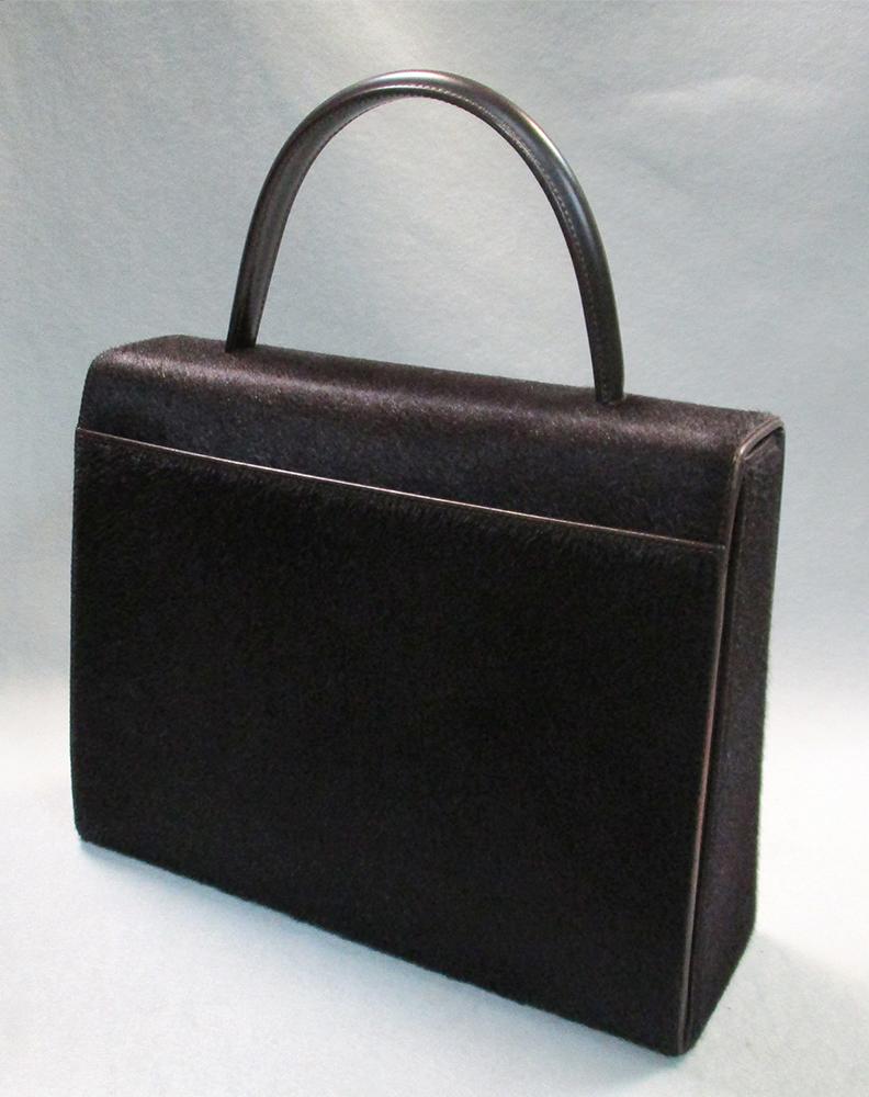Cartier, a brown ponyskin handbag, with gilt 'panthere' clasp and original dust bag 22 x 28cm (9 x - Image 2 of 5