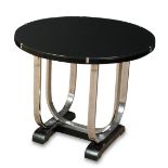 An ebonised and chrome circular occasional table, with circular black glass tops over a double