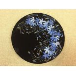 Lavorazione a Mano, Murano, a large enamelled glass charger, the black glass enamelled in blue and