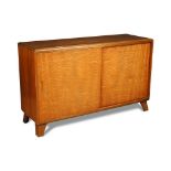 David Joel Ltd., a burr maple and walnut sideboard, the rectangular top above a pair of sliding