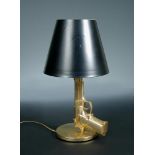 Philippe Starck for Flos, a Beretta table lamp, finished in gold, the base inscribed with the